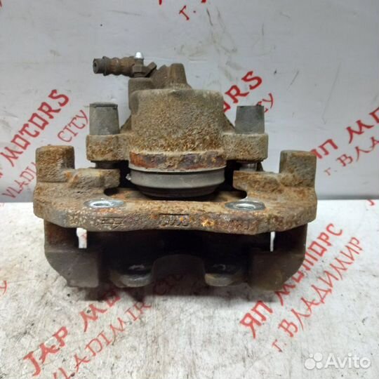 Суппорт тормозной передний левый Mazda Premacy CW