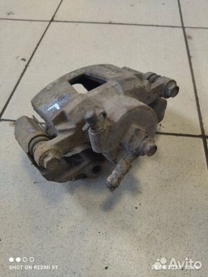 Суппорт тормозной передний левый Daewoo Nexia