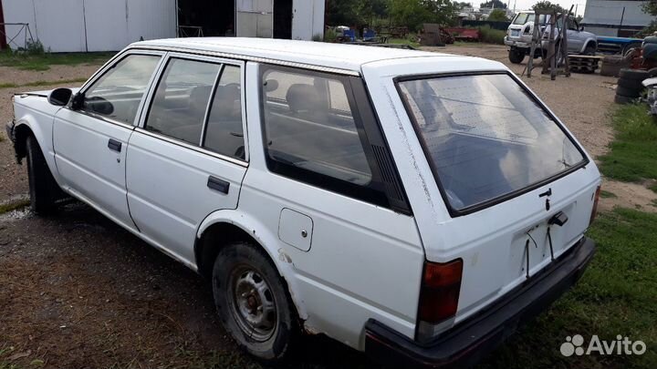 Стекла багажника nissan bluebird veu11