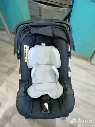 Коляска автолюлька