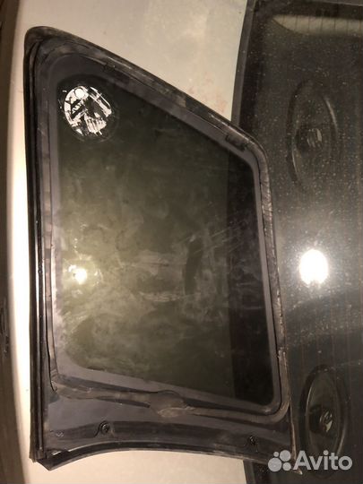 Стекло боковое заднее левое lancer 9
