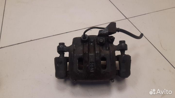 Суппорт передний левый Mitsubishi Pajero Sport