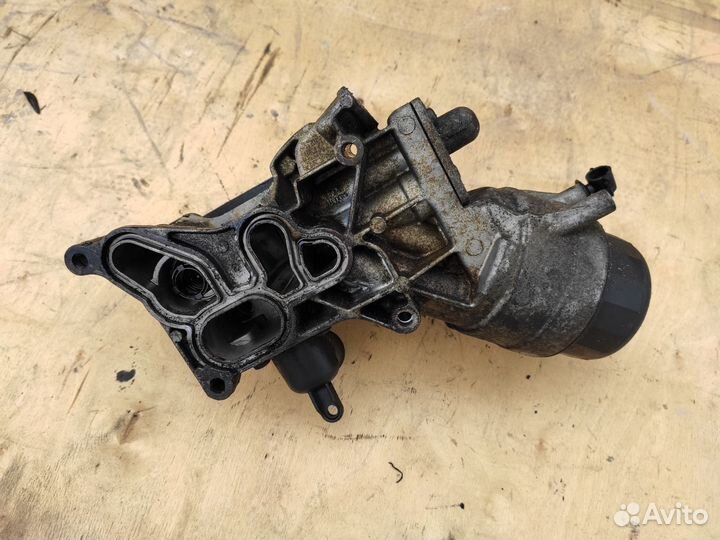 Корпус масляного фильтра A13DTE Opel Astra J