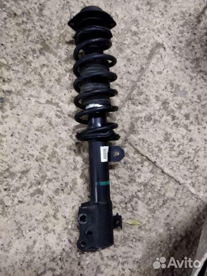 Стойка передняя Тайота пассо