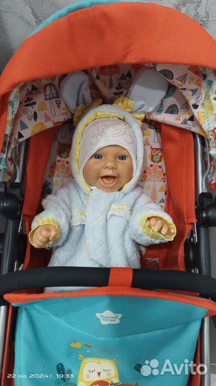 Детская игрушечная коляска