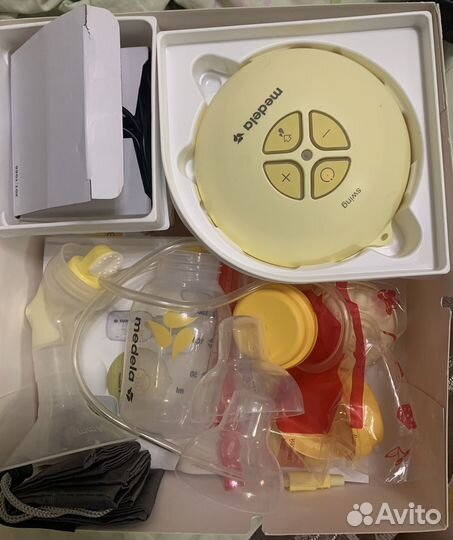 Молокоотсос medela электрический