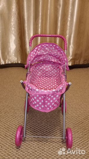 Игрушечная коляска для кукол