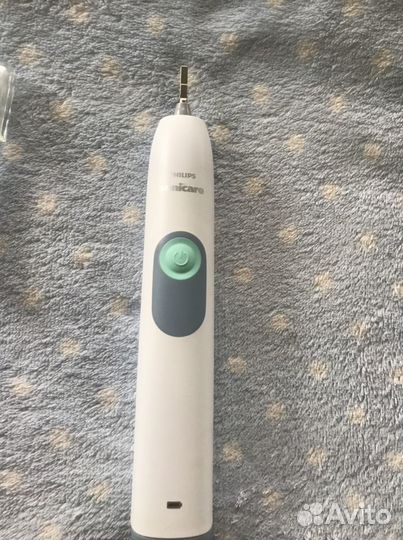 Новая эктрическая зубная щетка philips sonicare