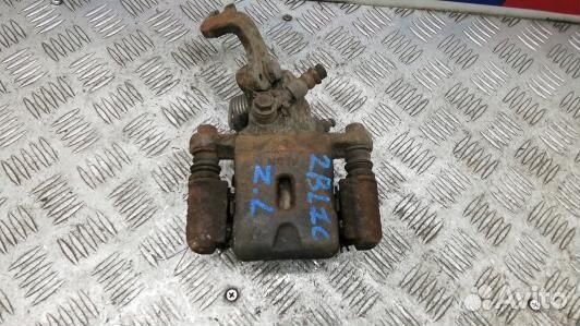 Суппорт тормозной задний левый KIA cerato 1 (2BL10