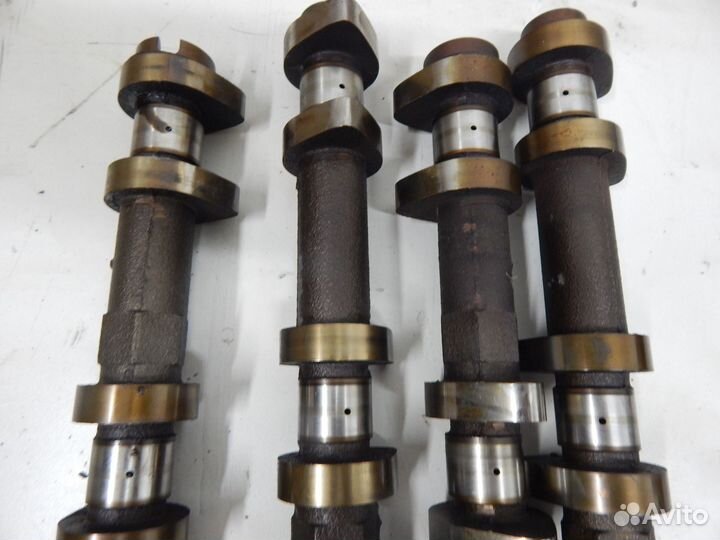 Распредвал Nissan VQ20