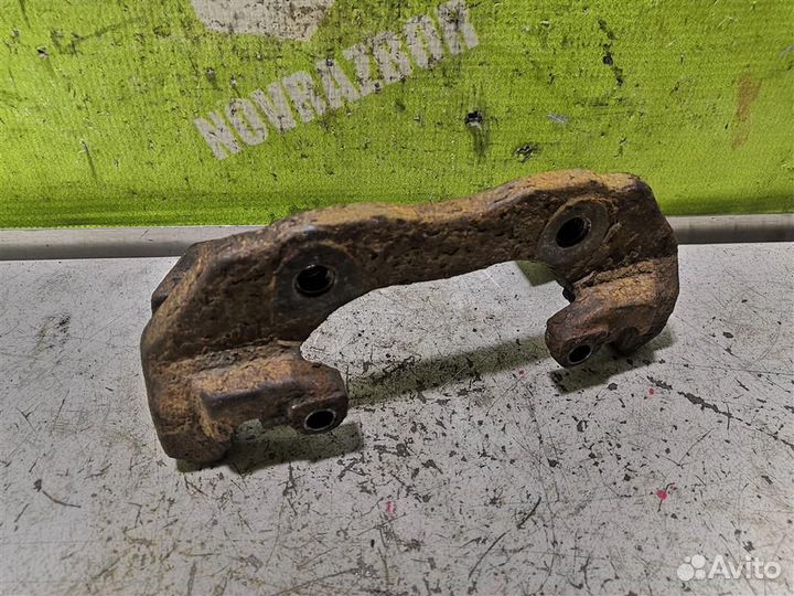 Скоба суппорта переднего Форд Торнео Коннект