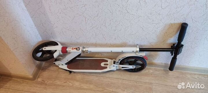 Самокат взрослый с амортизаторами складной