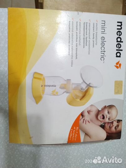 Молокоотсос medela электрический