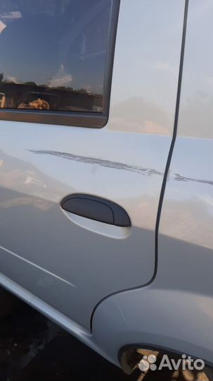 Дверь задняя левая на renault logan