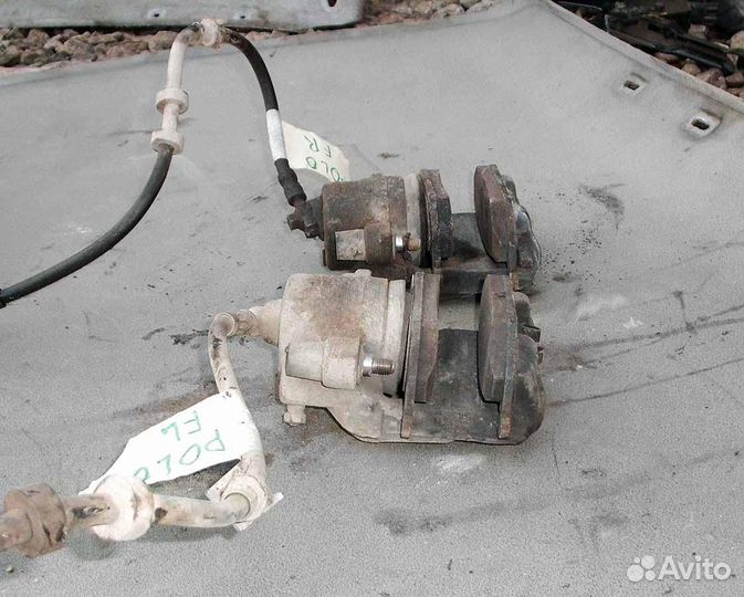 Суппорт передний VW Polo 04г 1.4 16кл