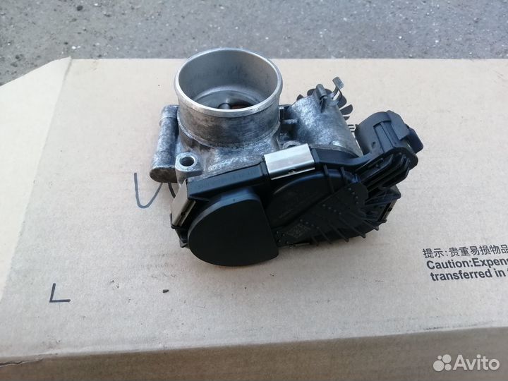 Дроссельная заслонка Opel Corsa D 1.2л