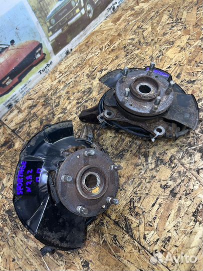 Кулак ступица перед Киа Спортейж 2