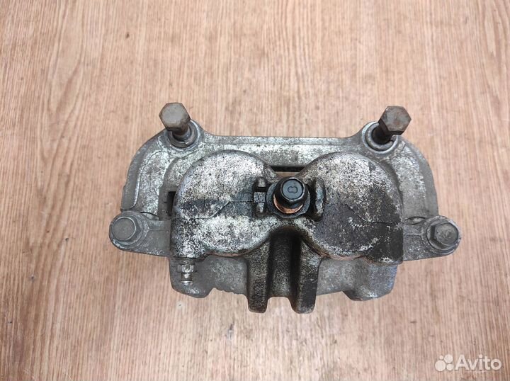 Суппорт передний левый Kia Mohave (HM) 2008-н.в