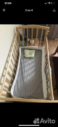 Детская кроватка с маятником