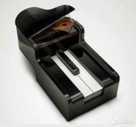 Репетитор по игре на фортепиано