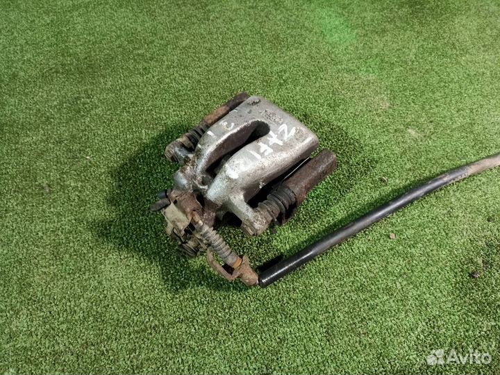 Тормозной суппорт задний правый Opel Zafira B