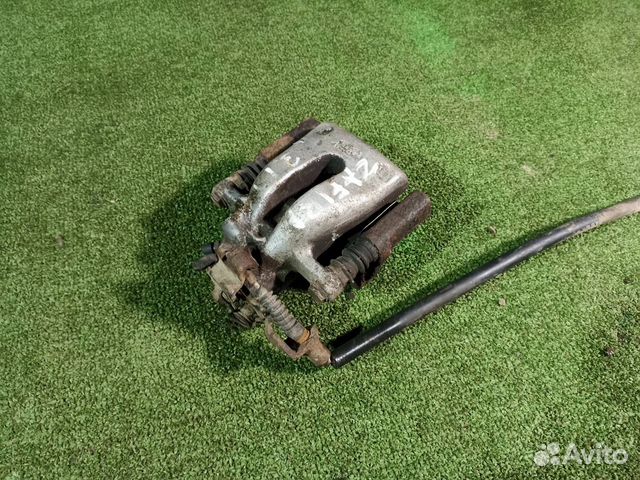 Тормозной суппорт задний правый Opel Zafira B