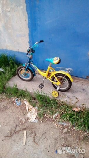 Детский четырёх колёсный велосипед