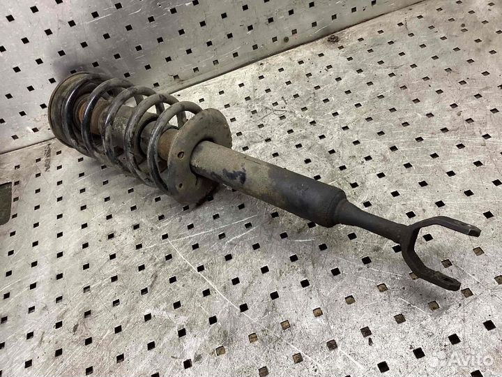 Амортизатор/стойка передняя левая Volkswagen Passa