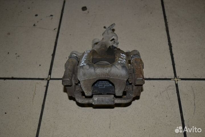 Тормозной суппорт задний левый Volkswagen Jetta 5