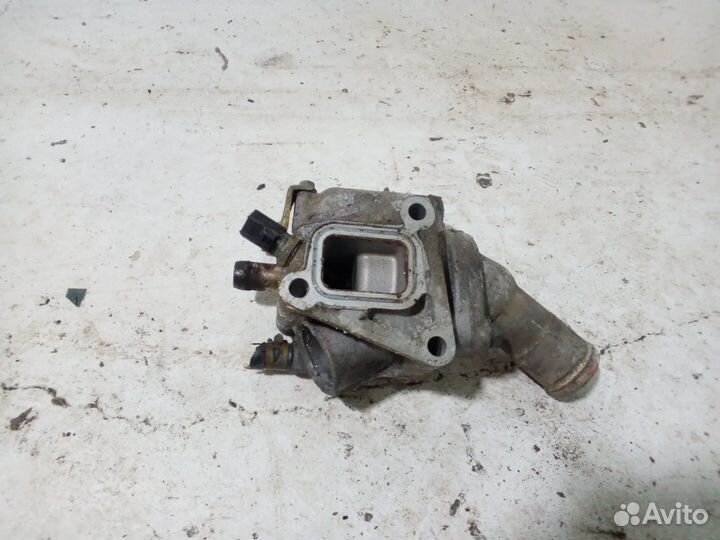 Корпус термостата lancer Cedia 9