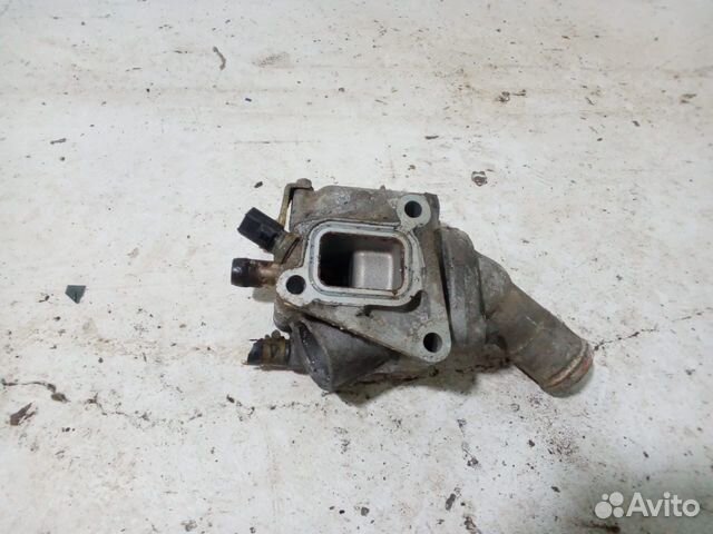 Корпус термостата lancer Cedia 9