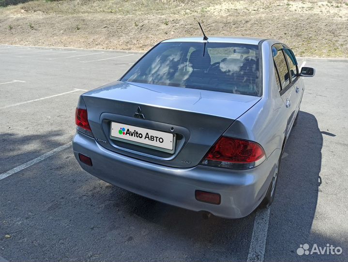 Mitsubishi Lancer 1.6 МТ, 2006, 413 523 км