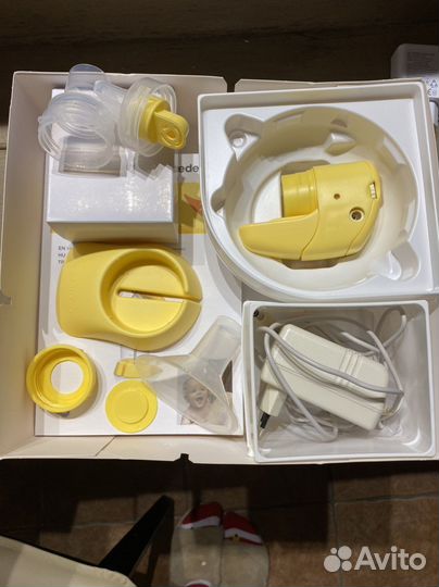 Молокоотсос medela электрический