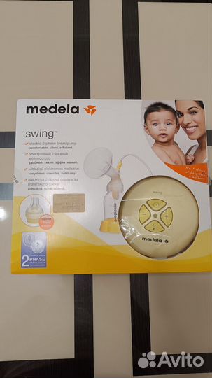 Молокоотсос medela swing электрический