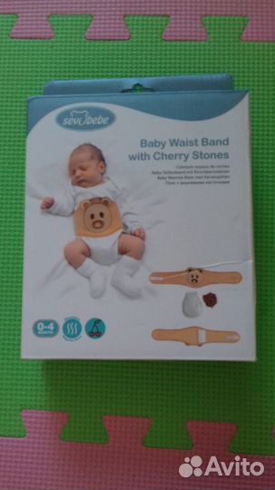 Пояс с вишневыми косточками для малыша