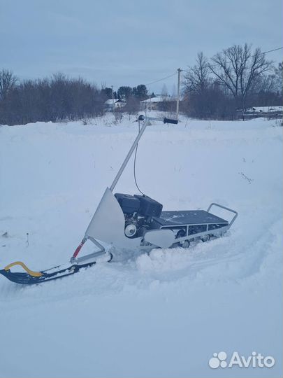 Мотоснегокат 