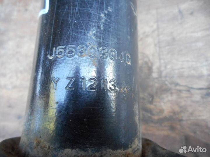 Амортизатор задний левый Kia Clarus 1996-2001