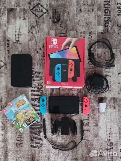 Nintendo Switch oled 64gb + 2 игры и переходник