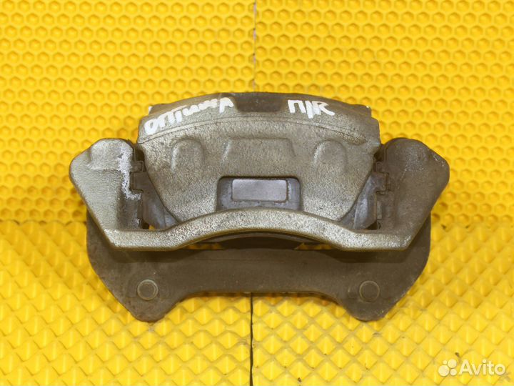 Суппорт передний правый Kia Optima 4