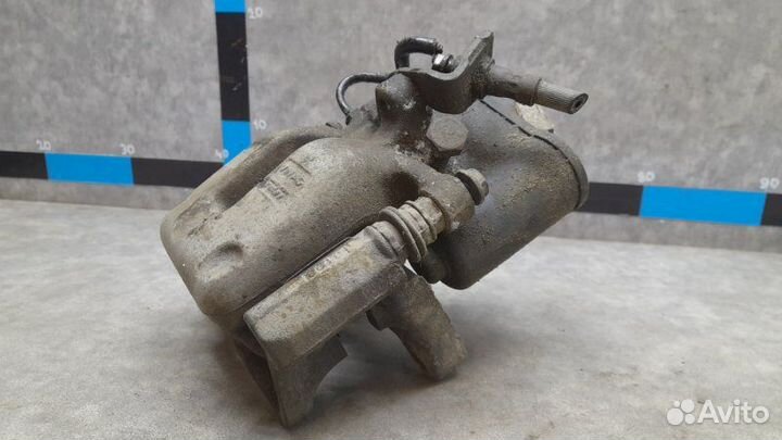 Суппорт задний левый Volkswagen Passat B6 2.0 cbab