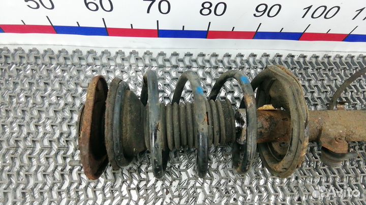 Стойка передняя Toyota Corolla (00-06 года) NZE120