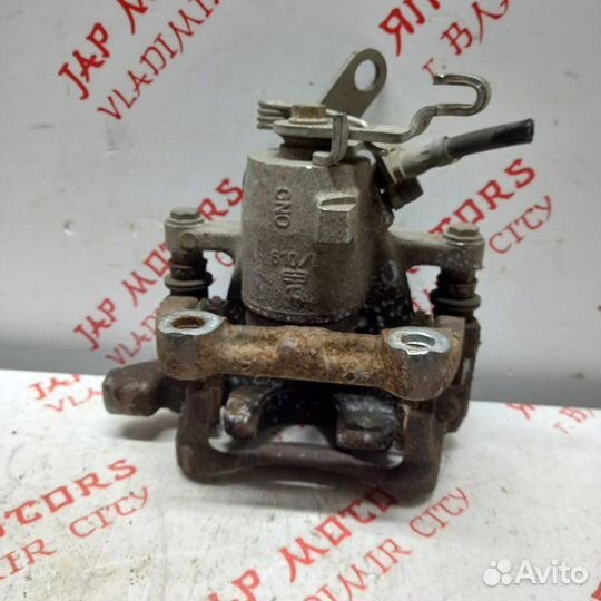 Суппорт тормозной задний правый Volkswagen Touran