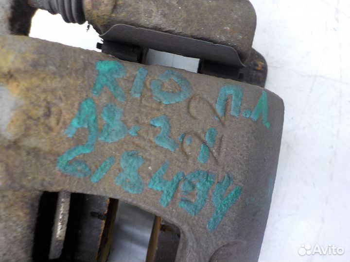 Суппорт тормозной передний левый на Kia Rio