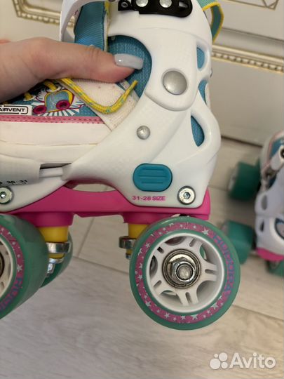 Ролики квадры раздвижные 28-31