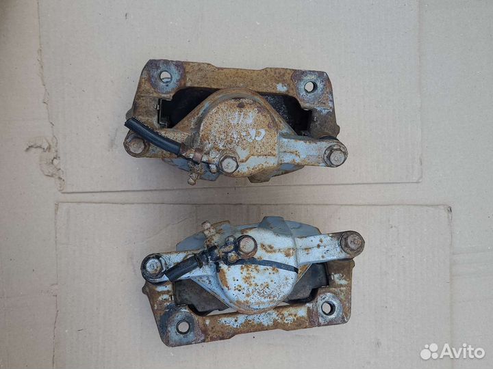 Суппорт тормозной передний Honda CR-V 1