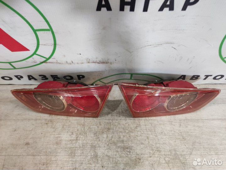 Фонарь в крышку багажника задний Mitsubishi Lancer