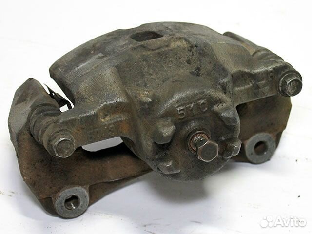 Суппорт тормозной передний Mitsubishi Pajero 3