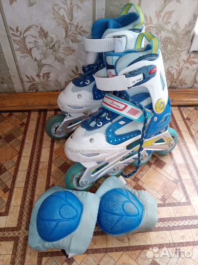 Роликовые коньки