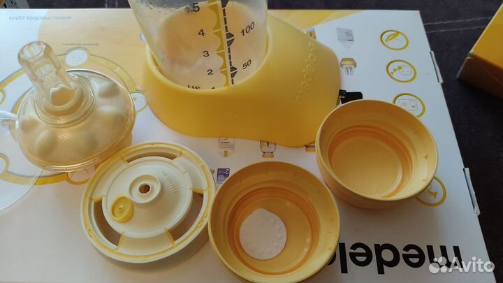 Молокоотсос ручной Медела+пакеты для хранения