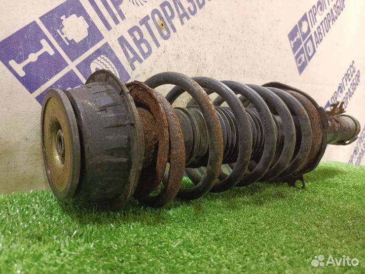 Амортизатор подвески передний левый Volkswagen